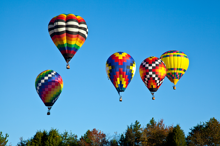 Hot air balloons fill the sky during the Carolina Balloon Festival Statesville North Carolina.